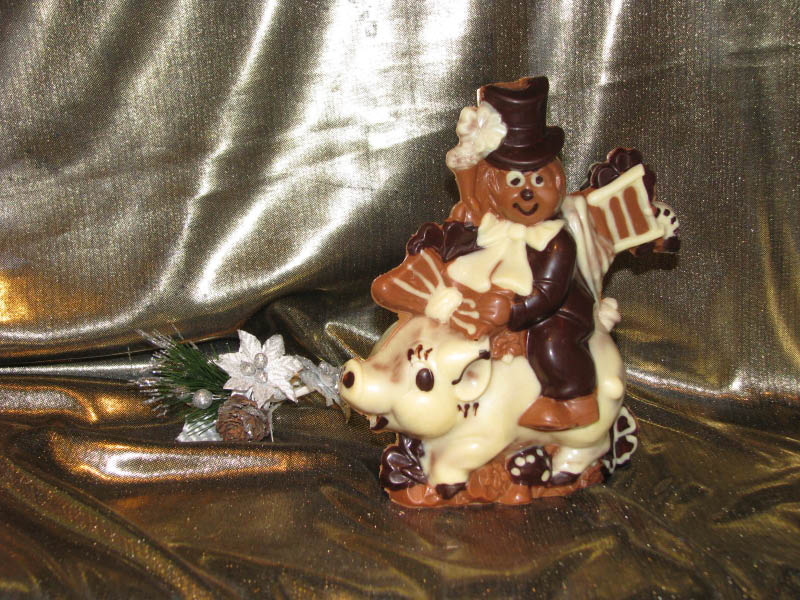 Kaminkehrer auf Schwein